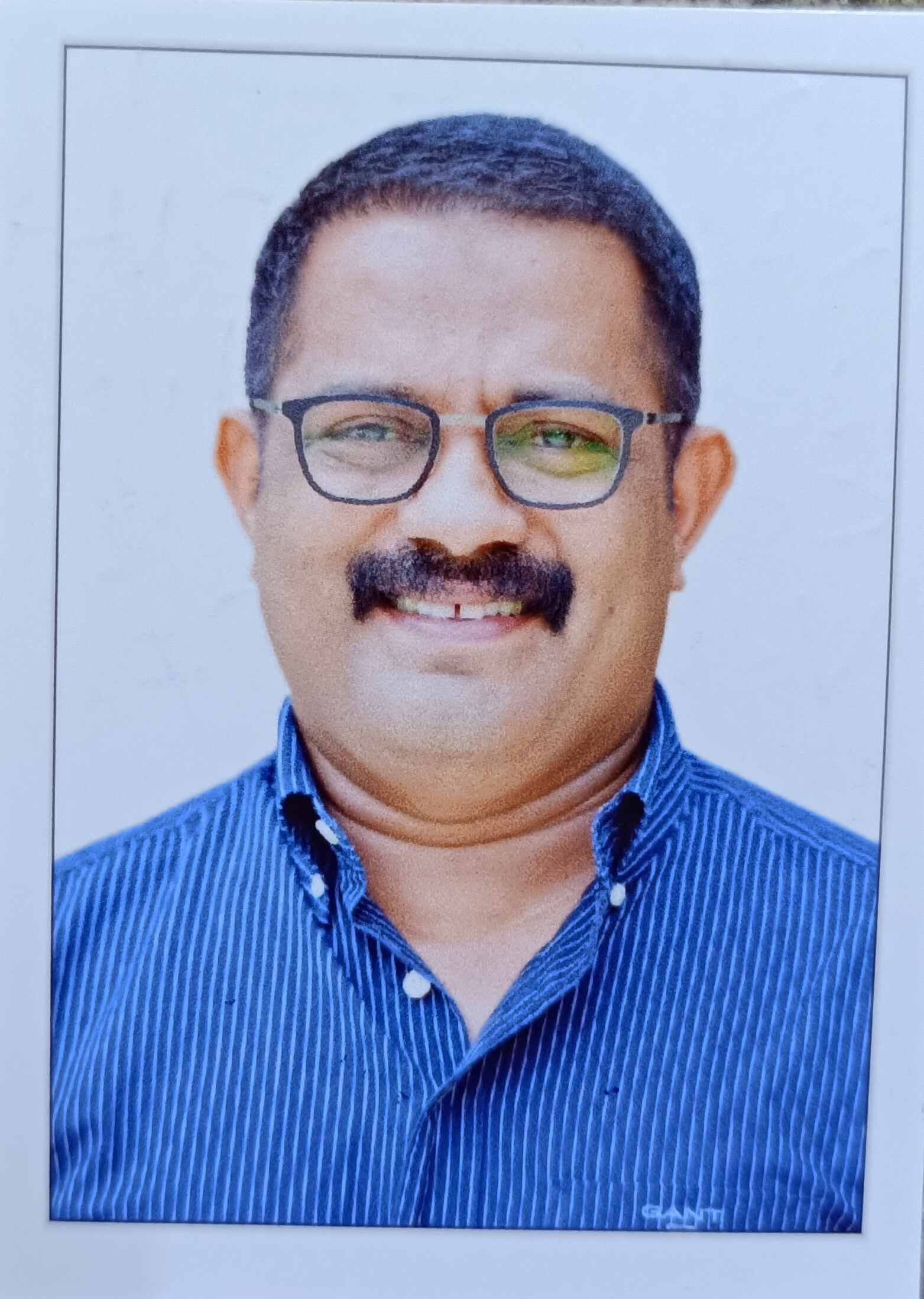 K.M. SHAJI