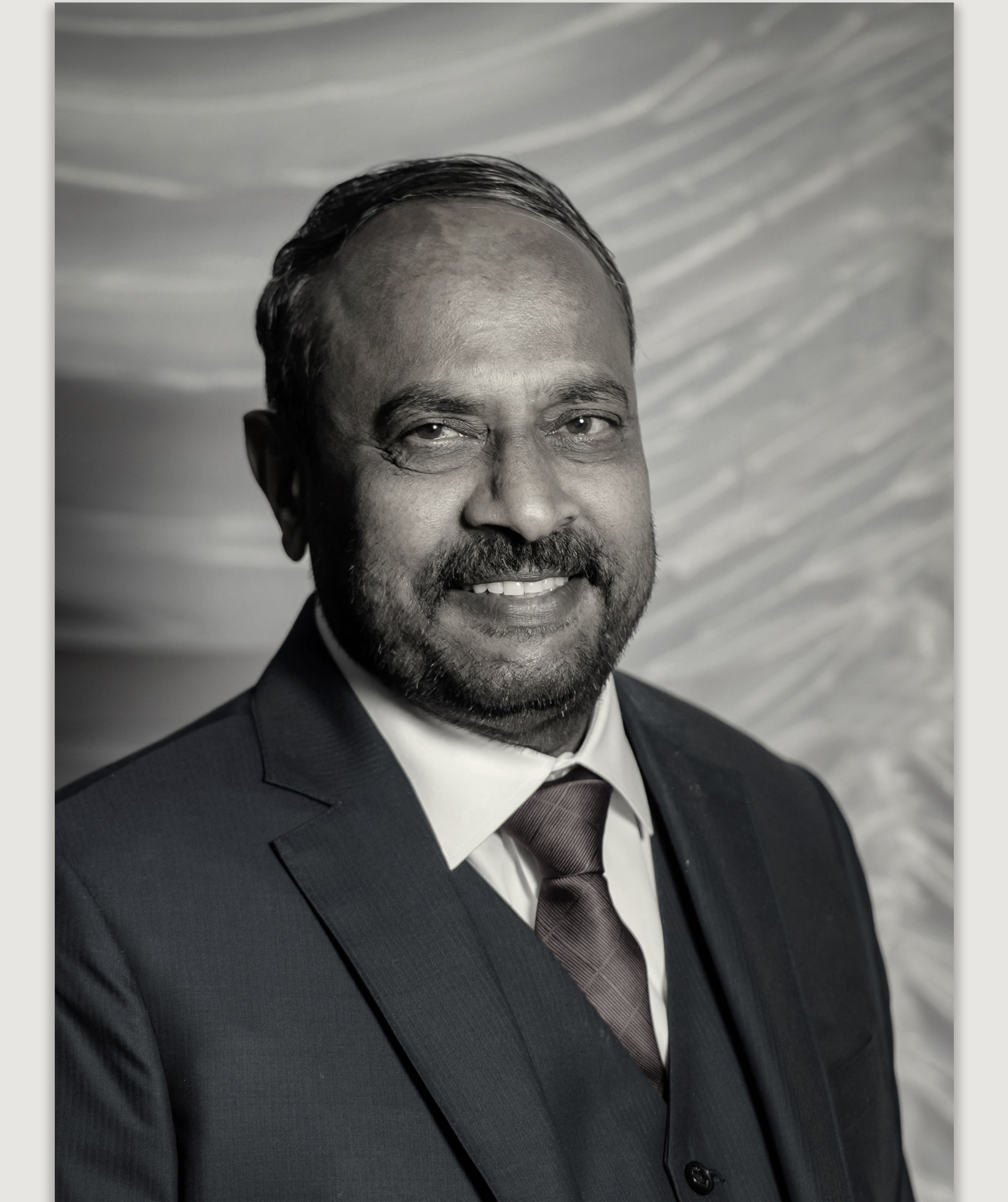 Late Sri S. L. Dharmegowda